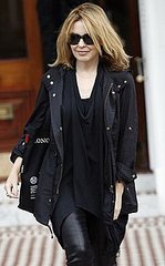 Kylie Minogue Wears a Black Anorak and Liquid Leggings Leaving Her Home in London