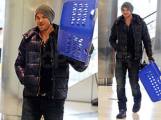 Photos of Kellan Lutz With a Laundry Basket in LA