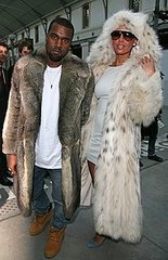 Kanye West and Amber Rose Wear Matching Furs to the Louis Vuitton 2010 Menswear Show in Paris