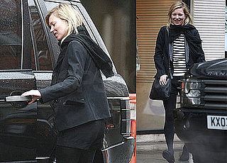 Photos of Kate Moss Taking a Break From London Fashion Week by Hanging Out With Friends and Smoking