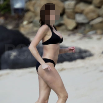 Guess Who's in a Black Bikini on the Beach? Guess Who's in a Black Bikini on the Beach?