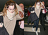Photos of Emma Watson Arriving in London with Elbow Patches on her Jumper