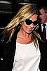 Kate Moss in London in Cropped Leather Pants, White Tee, and Two-Tone Sunglasses