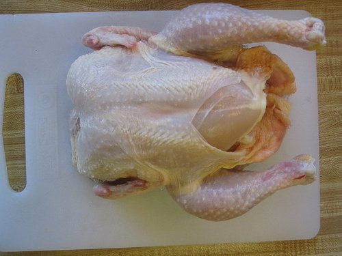 Pat the chicken dry. You don't want it slipping around while you remove the backbone.
Pat the chicken dry. You don't want it slipping around while you remove the backbone.