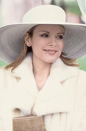 Samantha in her luxe all-white funeral attire.
Samantha in her luxe all-white funeral attire.
