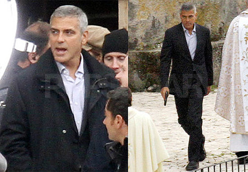 Pictures of George Clooney on the Set of The American Holding a Gun