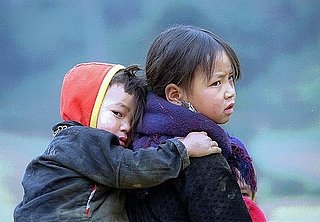 Children Carrying Siblings