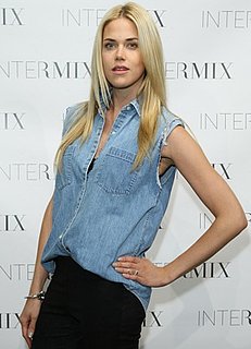 Pictures of Byrdie Bell Wearing Sleeveless Denim Shirt at Intermix Party