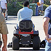 Guess Who's Riding Around the Set on a Lawn Mower?