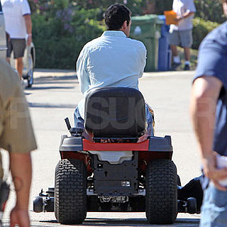 Guess Who's Riding Around the Set on a Lawn Mower?