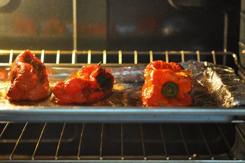 Be sure to watch them closely. Every 10 to 15 minutes, flip the bell peppers so each side of the pepper is charred.
Be sure to watch them closely. Every 10 to 15 minutes, flip the bell peppers so each side of the pepper is charred.
