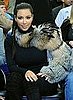 Kim Kardashian Wearing a Fur Sleeve