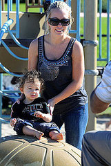 Kendra Wilkinson takes her son to the park