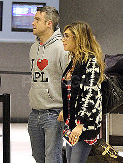 Pictures of Robbie Williams and Ayda Field at LAX Preparing For Christmas in the US
