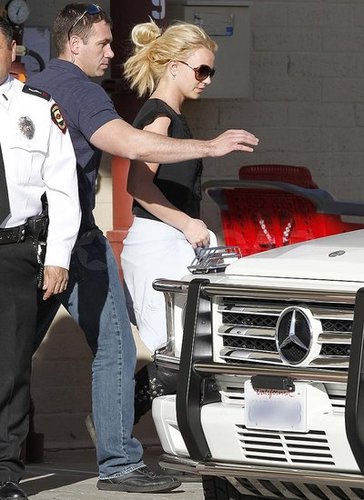 Britney Spears Steps Out as a Femme Fatale and Denies Dancing Body Double Rumors Britney Spears Steps Out as a Femme Fatale and Denies Dancing Body Double Rumors
