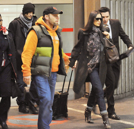 Ashton Kutcher and Demi Moore Stay Attached as They Land in Europe Ashton Kutcher and Demi Moore Stay Attached as They Land in Europe