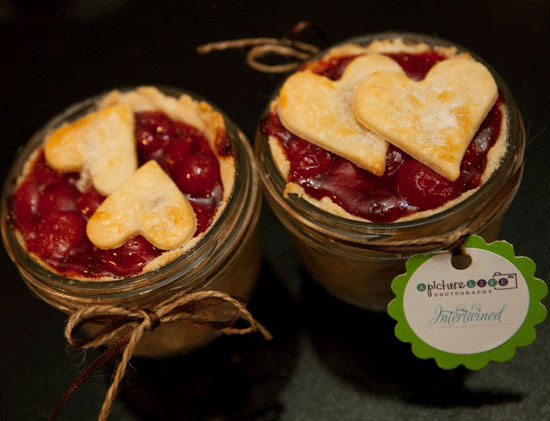 Cherry pie-in-a-jar favors are taken to the next level of cuteness with heart-shaped crust toppers!
Photo by Candice Benjamin
Cherry pie-in-a-jar favors are taken to the next level of cuteness with heart-shaped crust toppers!
Photo by Candice Benjamin