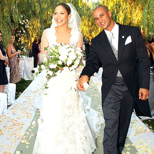 Jennifer Lopez and Chris Judd got hitched in Calabasas in September 2001. Jennifer wore a lovely lace Vera Wang gown for the outdoor affair.
Jennifer Lopez and Chris Judd got hitched in Calabasas in September 2001. Jennifer wore a lovely lace Vera Wang gown for the outdoor affair.