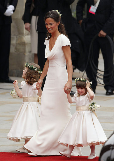 Pippa Middleton in Alexander McQueen by Sarah Burton, young bridesmaid's dresses in Nicki Macfarlane Pippa Middleton in Alexander McQueen by Sarah Burton, young bridesmaid's dresses in Nicki Macfarlane