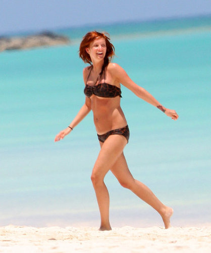A newly pregnant Ashlee Simpson took to the beach in a bikini while honeymooning with Pete Wentz in the Caribbean.
A newly pregnant Ashlee Simpson took to the beach in a bikini while honeymooning with Pete Wentz in the Caribbean.