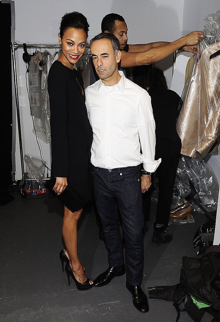 Zoe hung out backstage with Francisco Costa during the Fall 2011 Calvin Klein show, wearing a black sheath dress from the collection.
Zoe hung out backstage with Francisco Costa during the Fall 2011 Calvin Klein show, wearing a black sheath dress from the collection.