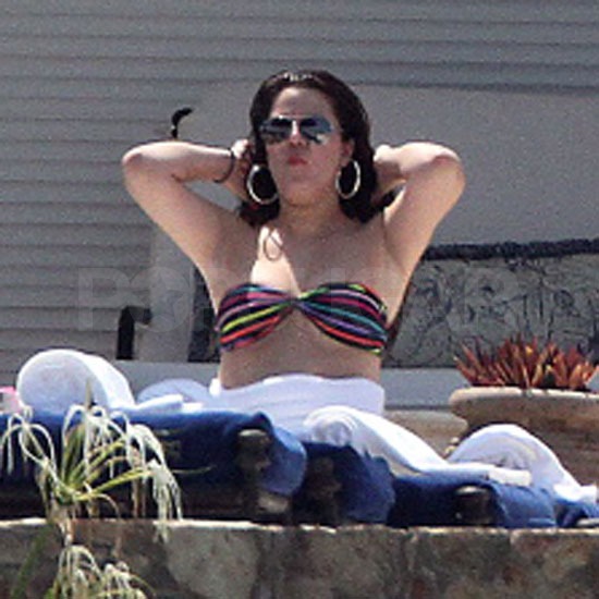 Khloe Kardashian wore a rainbow bikini. Khloe Kardashian wore a rainbow bikini.