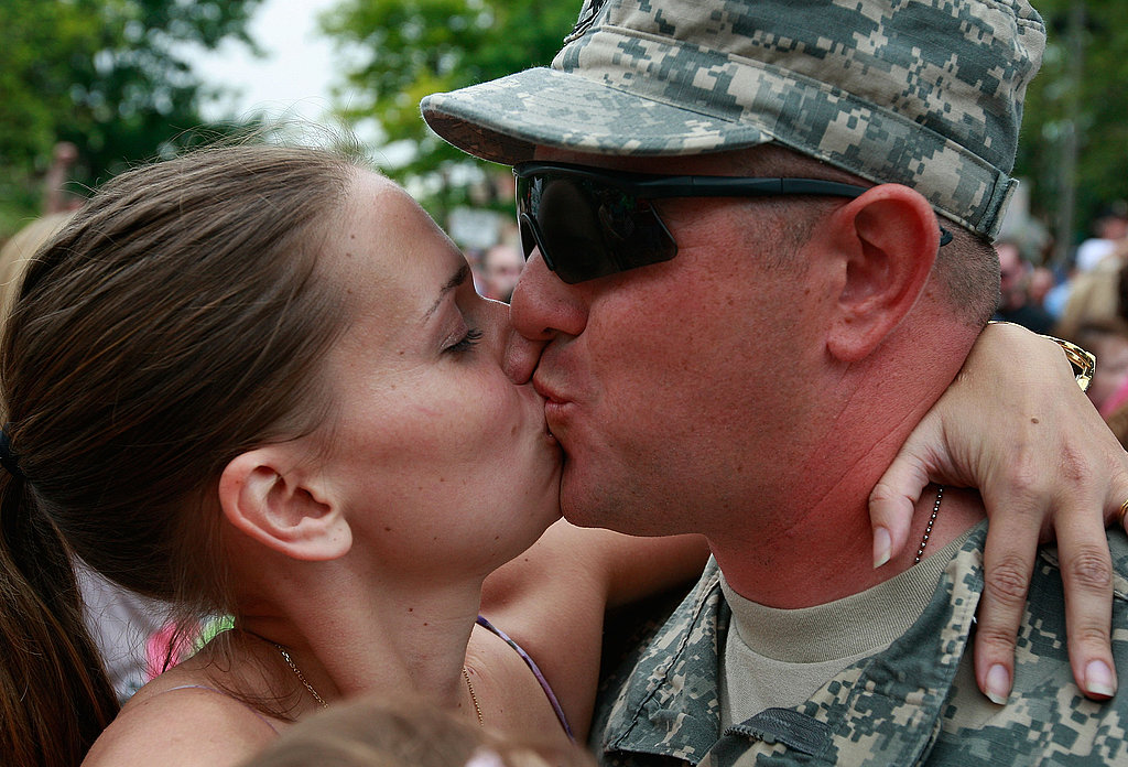 Matthew Burleson of the Illinois Army National Guard is welcomed home with a kiss from his wife, Nadine, in 2009.
Matthew Burleson of the Illinois Army National Guard is welcomed home with a kiss from his wife, Nadine, in 2009.