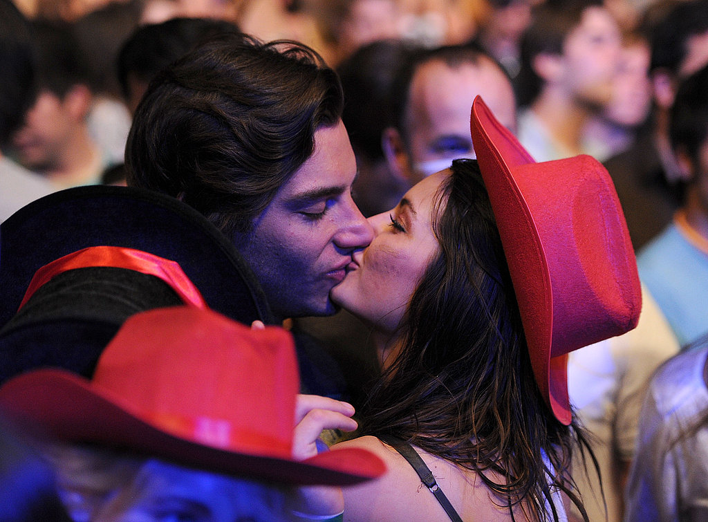 Fans kissed in the audience while attending Coachella in Indio, CA.
Fans kissed in the audience while attending Coachella in Indio, CA.