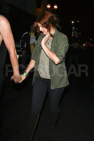 Drew Barrymore parties in green.
Drew Barrymore parties in green.