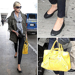 Charlize Theron Carrying a Yellow Balenciaga Bag