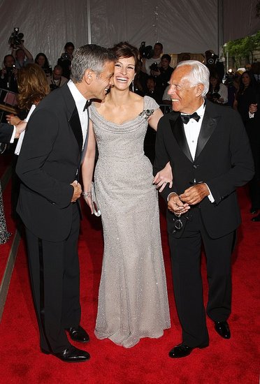 Julia Roberts flashed her famous smile with George Clooney and Giorgio Armani at the Costume Institute Gala in 2008.
Julia Roberts flashed her famous smile with George Clooney and Giorgio Armani at the Costume Institute Gala in 2008.