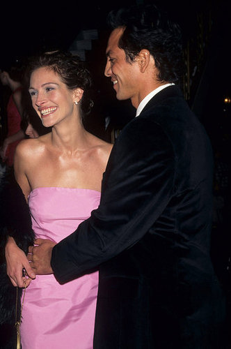Julia Roberts smiled in a bubblegum-pink dress at the premiere of Stepmom in 1998 with then-boyfriend Benjamin Bratt.
Julia Roberts smiled in a bubblegum-pink dress at the premiere of Stepmom in 1998 with then-boyfriend Benjamin Bratt.