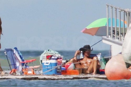 Matthew McConaughey was spotted lounging shirtless in a cowboy hat on the Tampa, FL, set of Magic Mike in October 2011.
Matthew McConaughey was spotted lounging shirtless in a cowboy hat on the Tampa, FL, set of Magic Mike in October 2011.