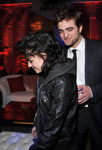 Robert Pattinson placed his hand on Kristen Stewart's back at the New Moon afterparty in November 2009 in LA.
Robert Pattinson placed his hand on Kristen Stewart's back at the New Moon afterparty in November 2009 in LA.