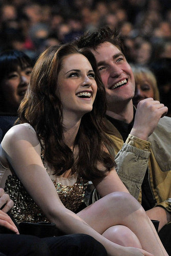 Robert Pattinson and Kristen Stewart sat close and laughed during the 2011 People's Choice Awards in LA in January.
Robert Pattinson and Kristen Stewart sat close and laughed during the 2011 People's Choice Awards in LA in January.