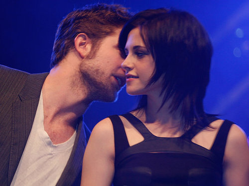Robert Pattinson whispered into Kristen Stewart's ear while promoting New Moon in Germany in November 2009.
Robert Pattinson whispered into Kristen Stewart's ear while promoting New Moon in Germany in November 2009.