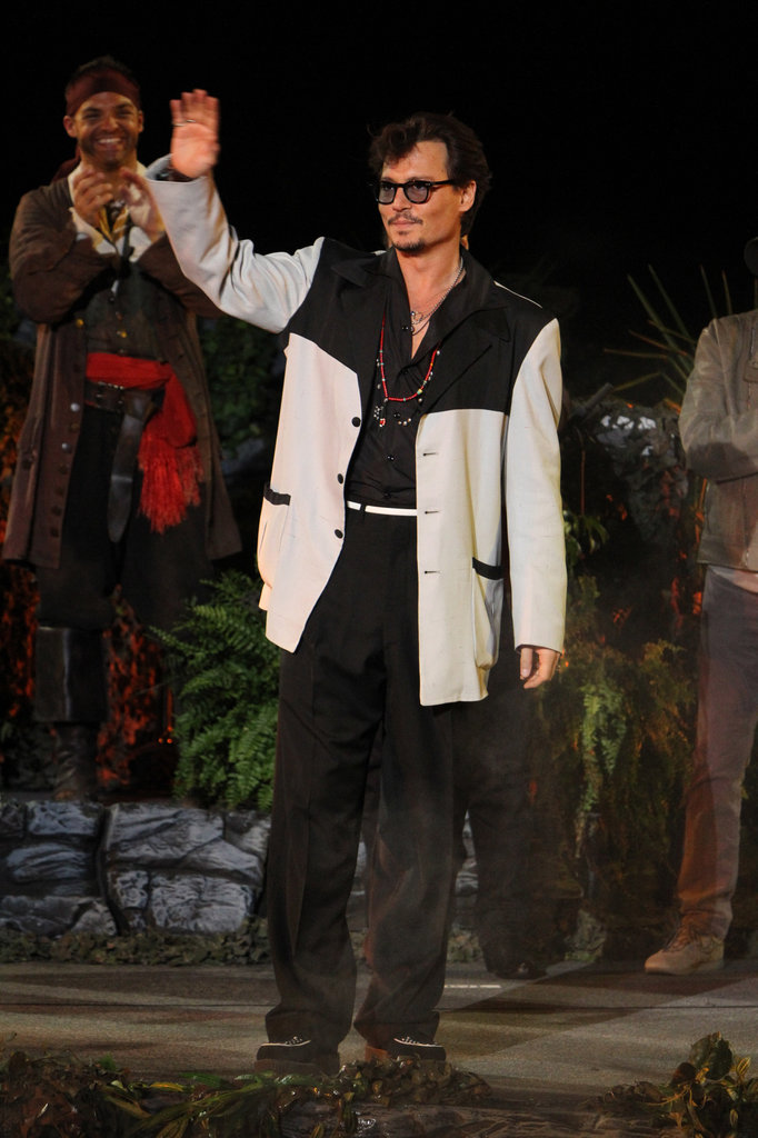 Johnny Depp waved to the Disneyland crowds at the premiere of Pirates of the Caribbean: On Stranger Tides in May 2011.
Johnny Depp waved to the Disneyland crowds at the premiere of Pirates of the Caribbean: On Stranger Tides in May 2011.