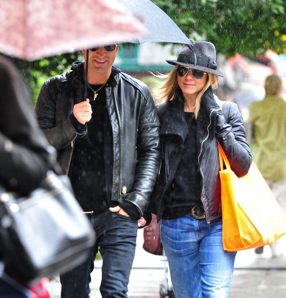 Justin held an umbrella over the couple as they ventured out during a rainy NYC day in September 2011.
Justin held an umbrella over the couple as they ventured out during a rainy NYC day in September 2011.