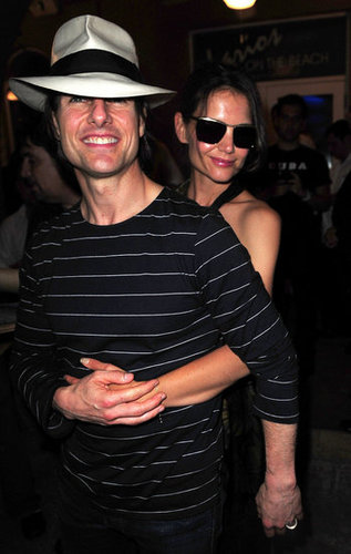 Katie Holmes gave Tom Cruise a squeeze from behind while hanging in Miami in June 2011.
Katie Holmes gave Tom Cruise a squeeze from behind while hanging in Miami in June 2011.