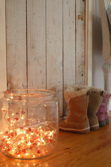 Scatter lights in an oversized glass vessel for an entryway nightlight.
Source
Scatter lights in an oversized glass vessel for an entryway nightlight.
Source