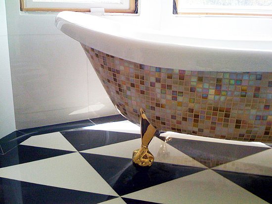Add a little Versace to your bathroom with a mosaic tub project.
Add a little Versace to your bathroom with a mosaic tub project.