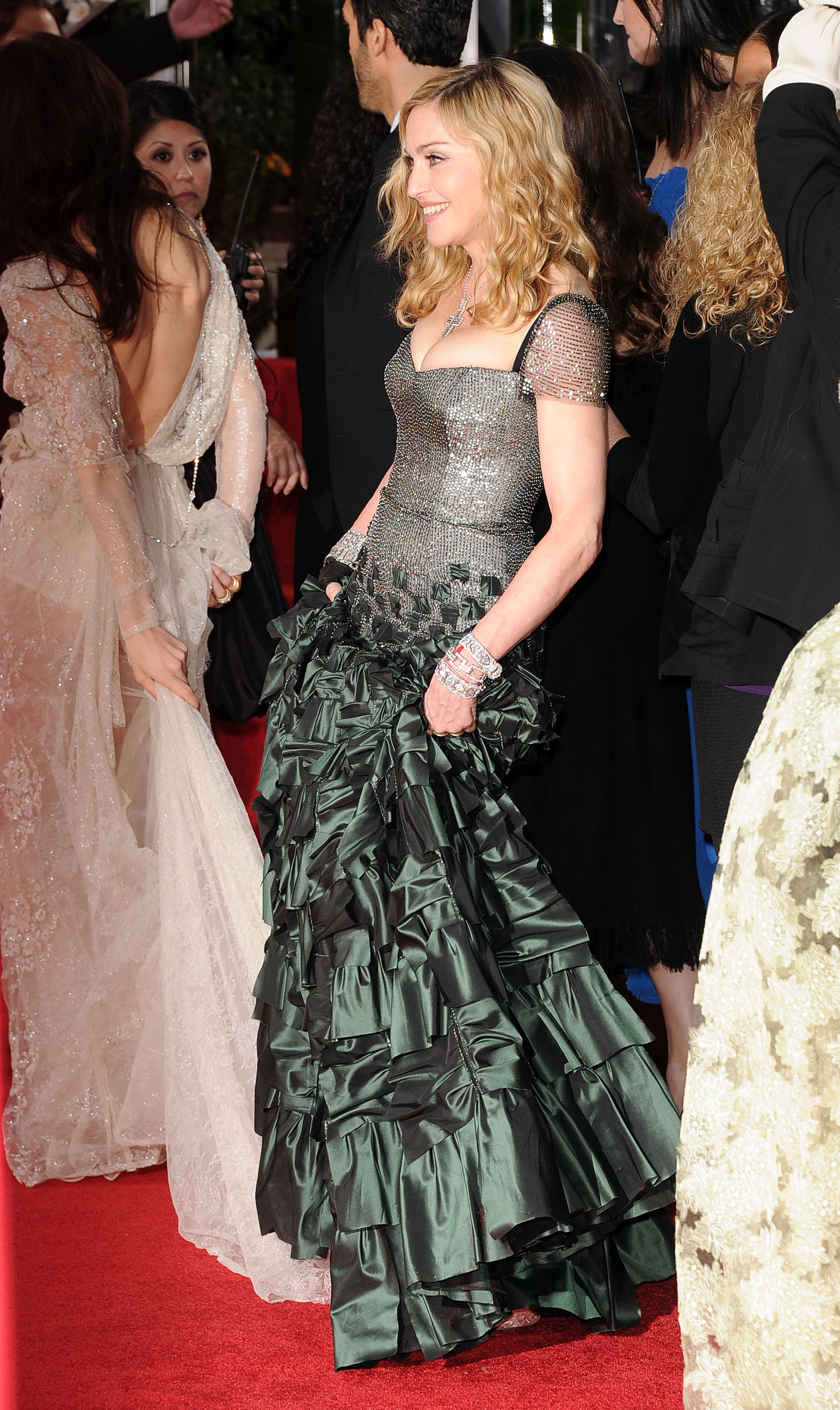 Madonna in Reem Acra at the Golden Globes. Madonna in Reem Acra at the Golden Globes.
