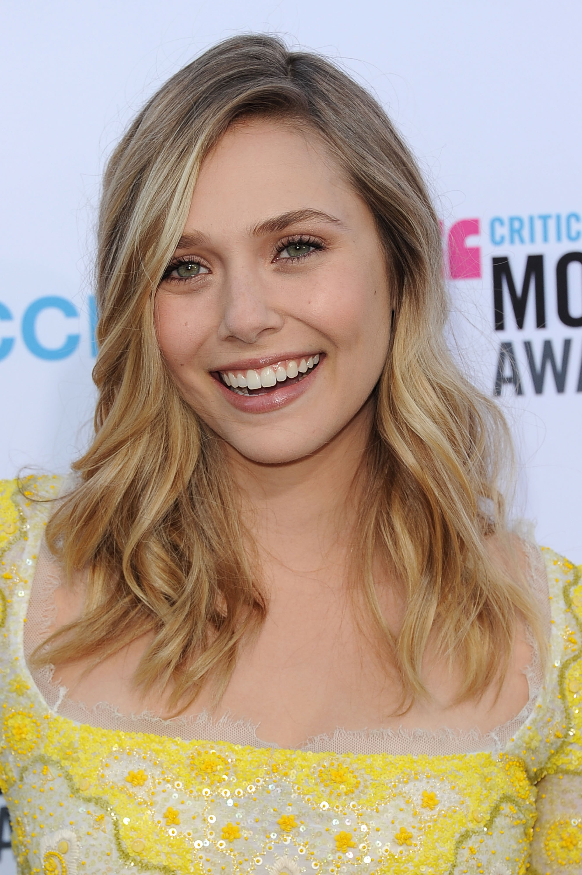 Elizabeth Olsen was glowing in a yellow Pucci dress at the 2012 Critics' Choice Movie Awards. Elizabeth Olsen was glowing in a yellow Pucci dress at the 2012 Critics' Choice Movie Awards.