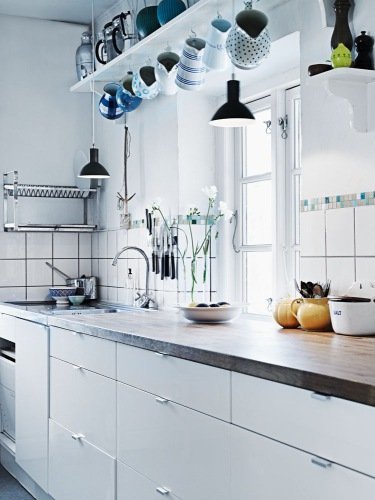 The chic, white kitchen.
The chic, white kitchen.