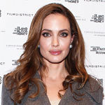 When Angelina Jolie Shared a Plane With Stacy Keibler When Angelina Jolie Shared a Plane With Stacy Keibler