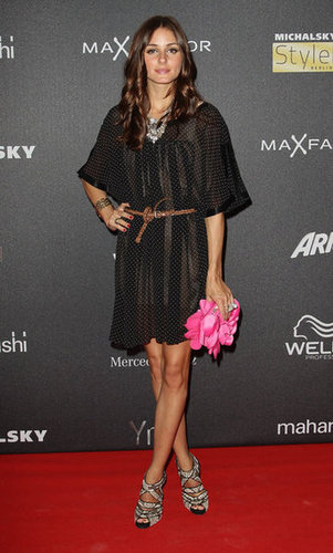 Olivia accented her Michalsky dress with statement-making accessories for an event in Berlin in 2010.
Olivia accented her Michalsky dress with statement-making accessories for an event in Berlin in 2010.