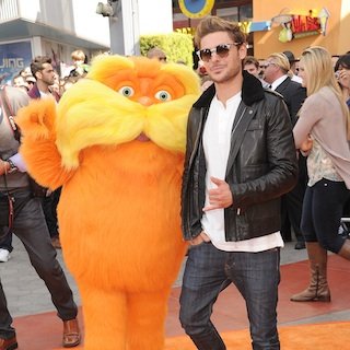 Zac Efron Drops Condom at The Lorax Premiere