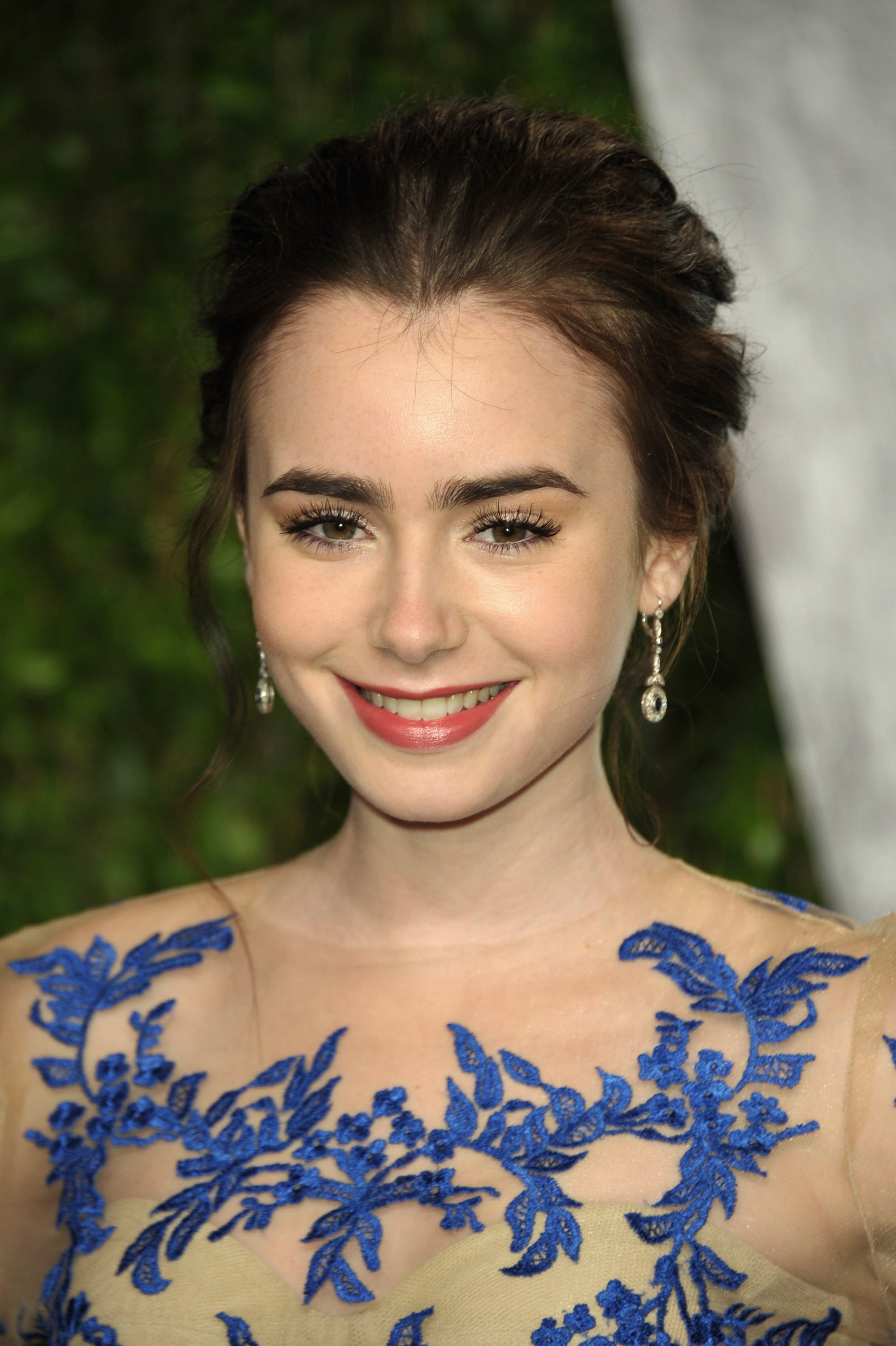 Lily Collins at the Vanity Fair Oscar party. Lily Collins at the Vanity Fair Oscar party.