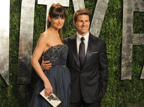 Tom and Katie smile for the photographers at Vanity Fair.
Tom and Katie smile for the photographers at Vanity Fair.