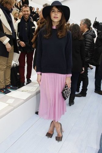 Caroline Sieber looked ultragirlie in a pink pleated skirt and bow-tie heels front row at Chloé.
Caroline Sieber looked ultragirlie in a pink pleated skirt and bow-tie heels front row at Chloé.